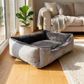 Square plush dog bed with dark gray insert, light gray textured sides, and dark border trim